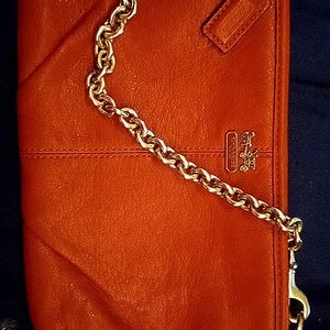 Leather orange and gold Coach Purse w/chain strap